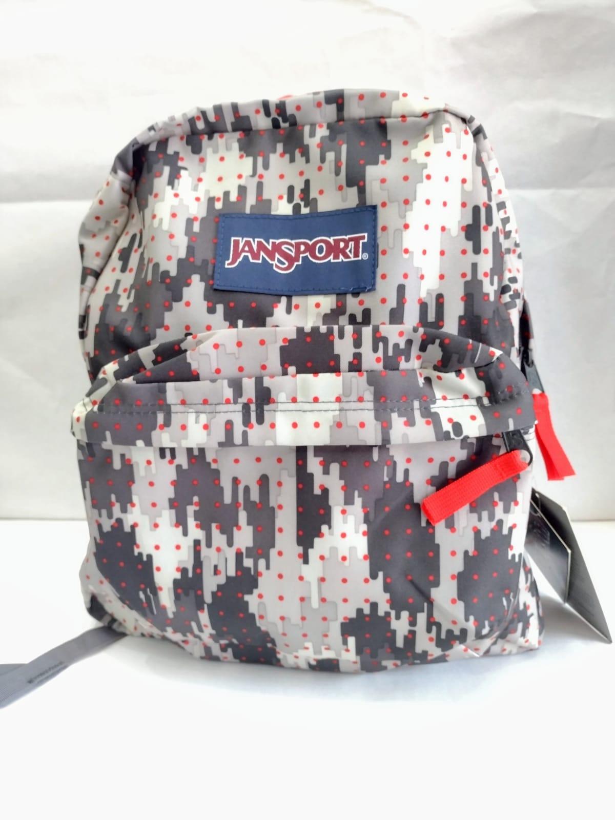 MOCHILA ESPALDA SPRING BREAK JANSPORT 21L - COLORES SURTIDOS