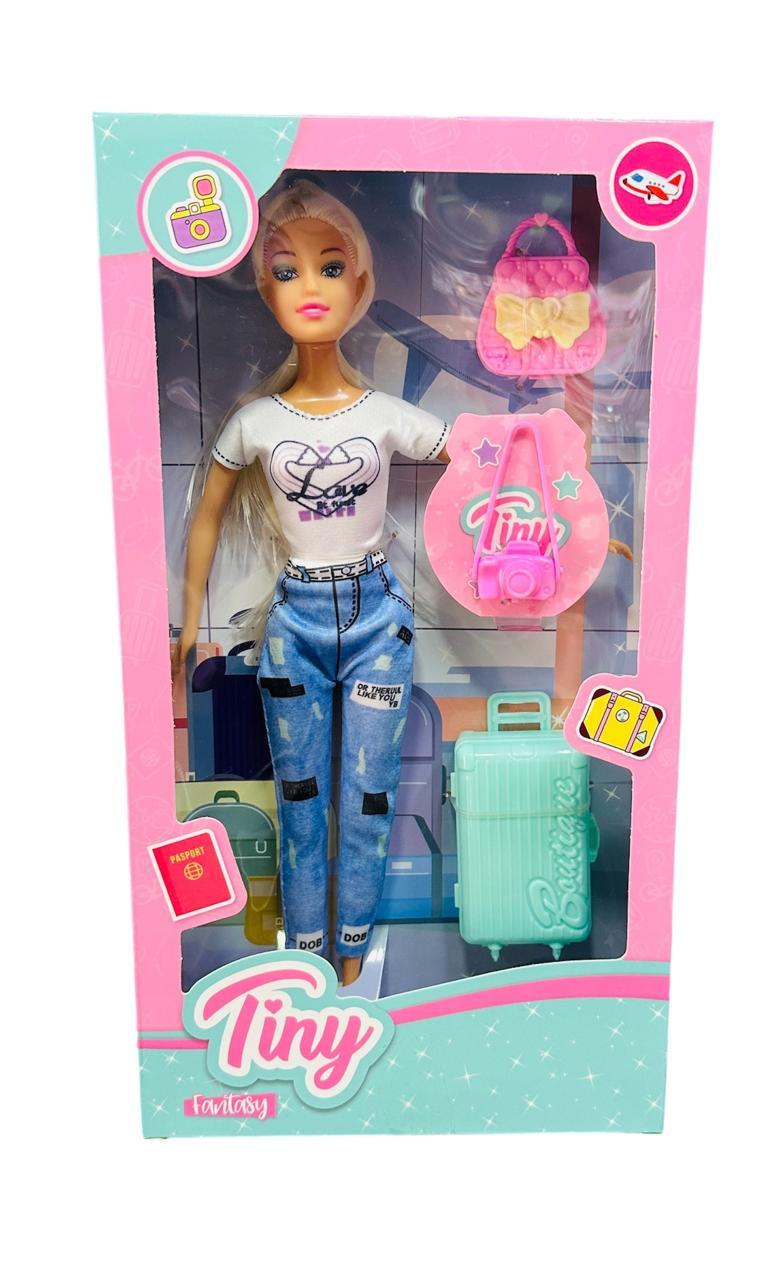 TINY MUÑECA VIAJERA