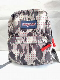 MOCHILA ESPALDA SPRING BREAK JANSPORT 21L - COLORES SURTIDOS